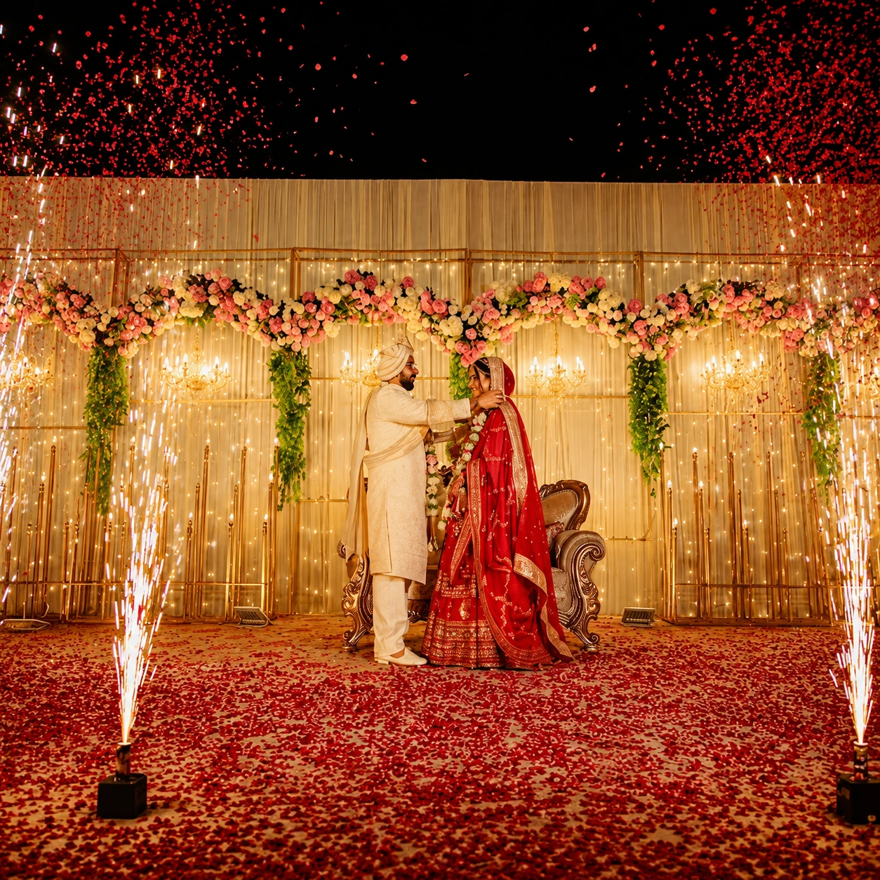 Bride and groom on Reception stage decor by DFD wedding & Events